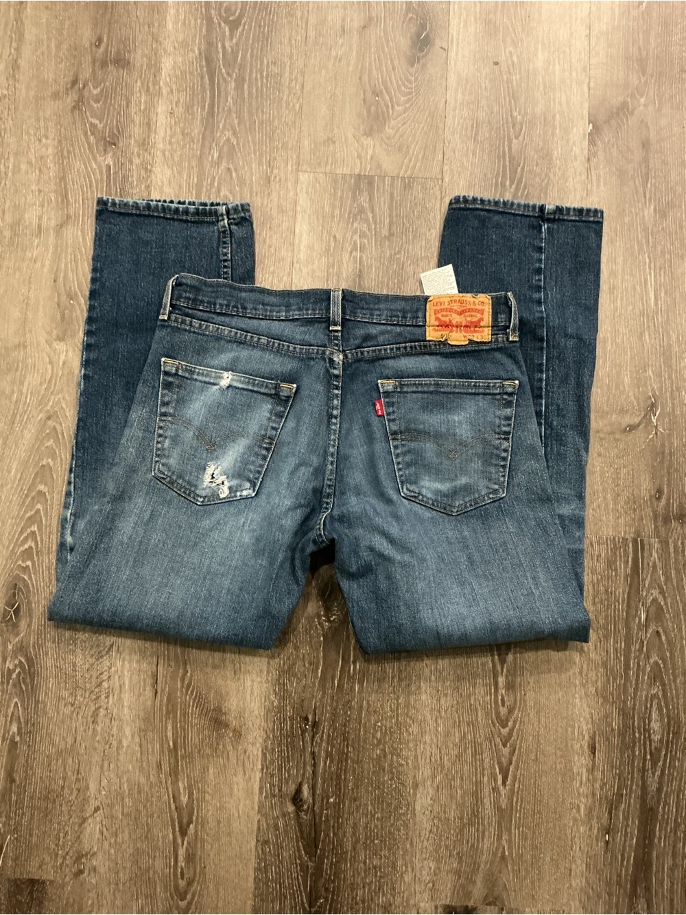 Levi's Men's Medium Blue Straight Jeans with Subtle Distressing, 32x30